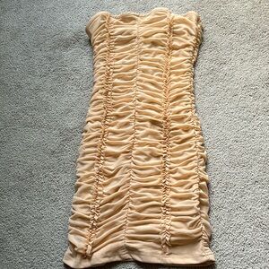 Nude ruffle mini dress